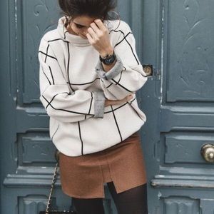 Cream/black grid short turtleneck sweater